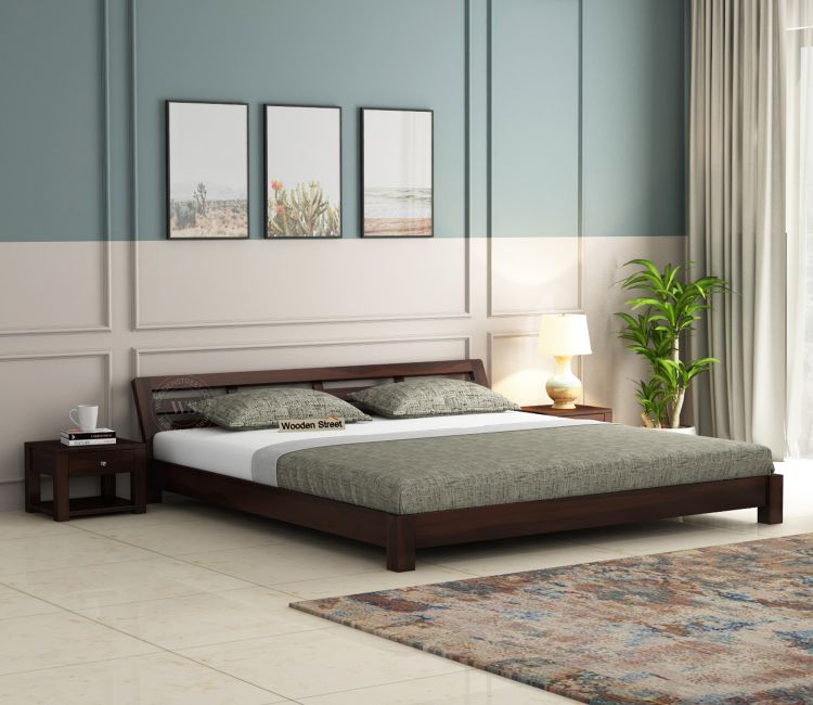 Classic wooden bed with elegant headboard design for modern bedroom decor.